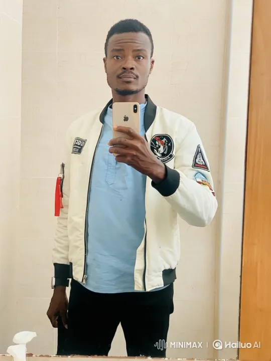 Young Man Takes Selfie, Gradually Smiles – AI Generated Video | Hailuo AI