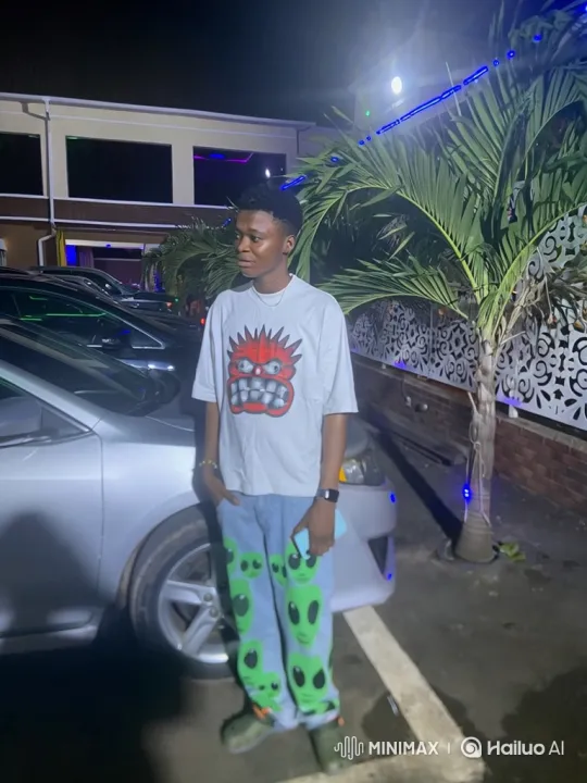Young Man Enters Car in Nighttime Parking Lot – AI Generated Video | Hailuo AI