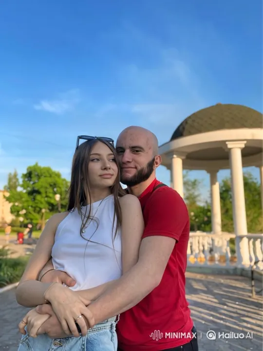 Family Embrace Captured in Park During Summer Evening – AI Generated Video | Hailuo AI