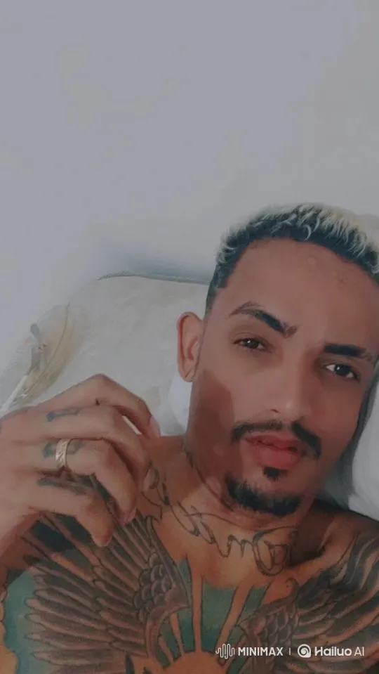 Man with Tattoos Holds Pistol, Smokes Calmly – AI Generated Video | Hailuo AI