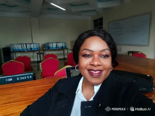 Professional Woman Sips Tea in Office Setting – AI Generated Video | Hailuo AI