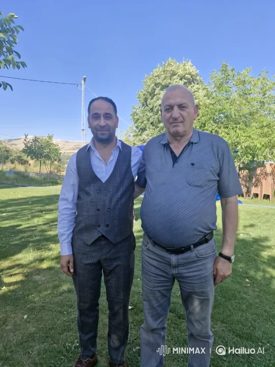 Two Men Share a Quiet Moment on a Sunny Lawn – AI Generated Video | Hailuo AI