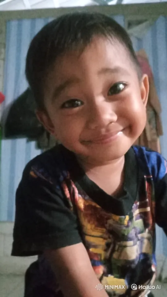 Young Boy's Joyful Expression Captured on Camera – AI Generated Video | Hailuo AI