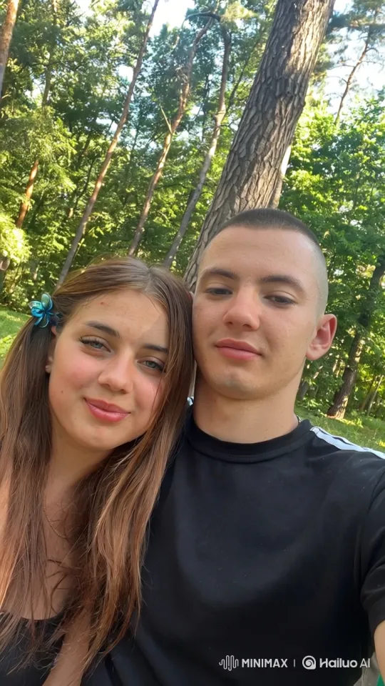 Young Couple in Peaceful Woods Amidst Gentle Breeze – AI Generated Video | Hailuo AI