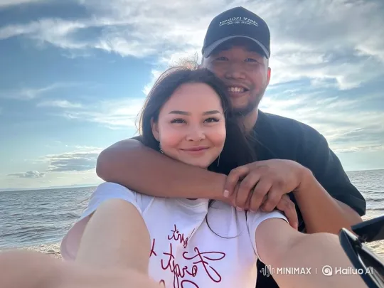 Asian Family Embraces on Beach - Heartwarming Moment – AI Generated Video | Hailuo AI