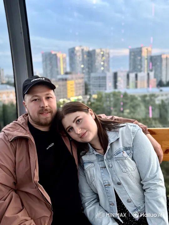 Young Couple Adores Their Newborn in a Ferris Wheel Cabin – AI Generated Video | Hailuo AI