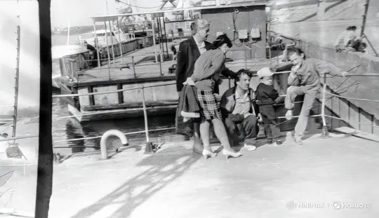 Vintage Black and White Video of a Family on a Boat Deck – AI Generated Video | Hailuo AI