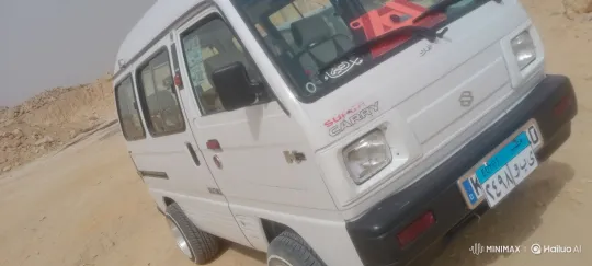 White Suzuki Van in Desert Landscape – AI Generated Video | Hailuo AI