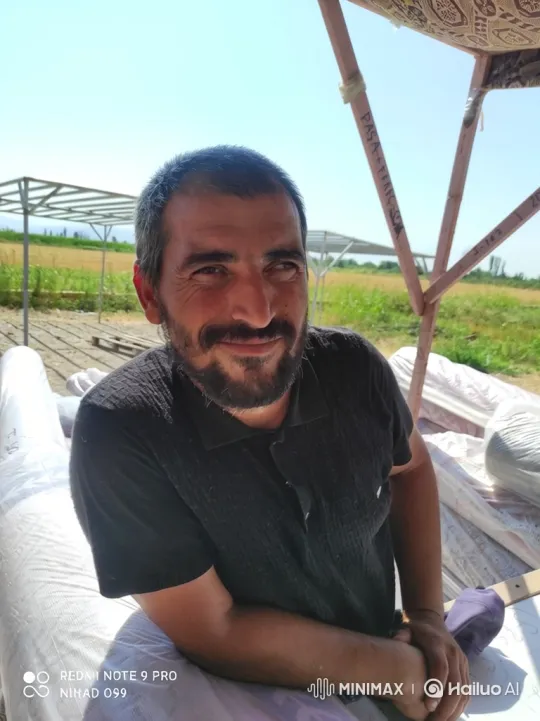 Middle-aged Man Detained by Police in Rural Setting – AI Generated Video | Hailuo AI