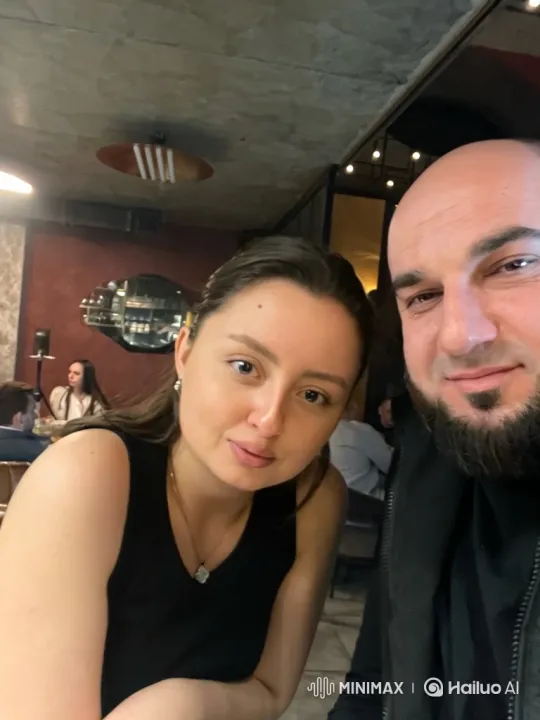 Young Family's Joyful Embrace Captured on Camera – AI Generated Video | Hailuo AI