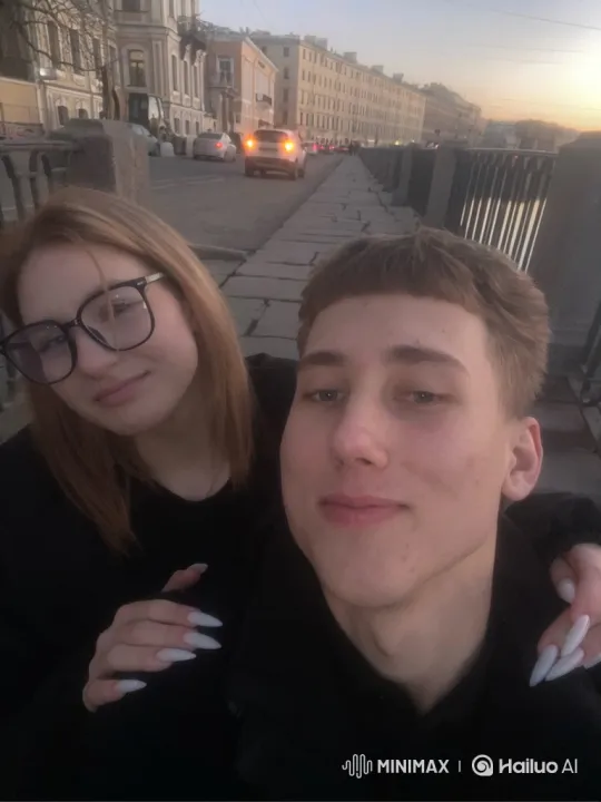 Young Family's Loving Embrace Captured on Dusk City Embankment – AI Generated Video | Hailuo AI