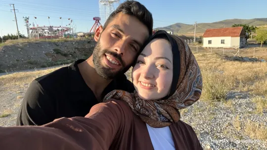 Happy Family Embraces on Sunny Rural Landscape – AI Generated Video | Hailuo AI