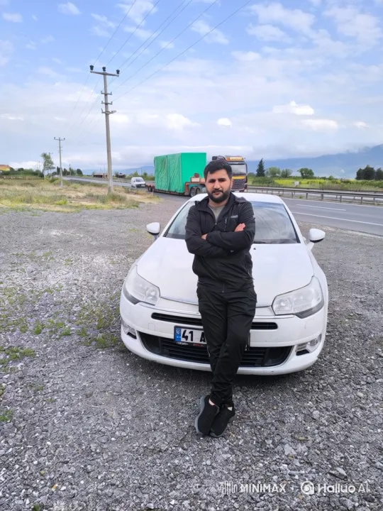 Man on Gravel Patch Amidst Highway Scene – AI Generated Video | Hailuo AI