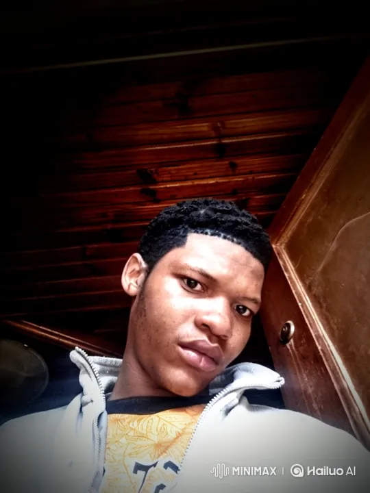 Young Black Man's Warm Smile and Gentle Nod – AI Generated Video | Hailuo AI