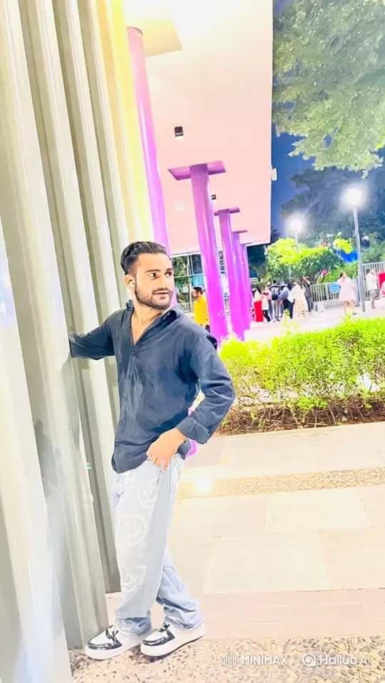 Young Man Reflects in Urban Night, Making Eye Contact – AI Generated Video | Hailuo AI
