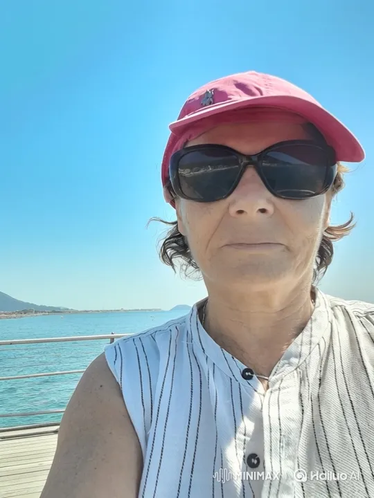 Woman Enjoying Serenity on Coastal Pier – AI Generated Video | Hailuo AI