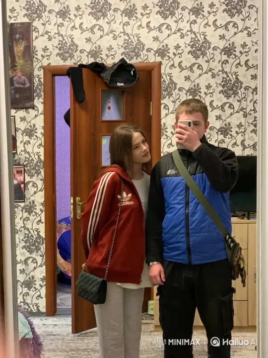 Young Family's Joyful Embrace Captured on Video – AI Generated Video | Hailuo AI