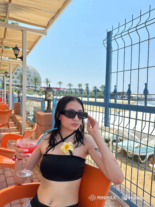 Young Woman Climbs Fence After Pouring Drink on Herself – AI Generated Video | Hailuo AI