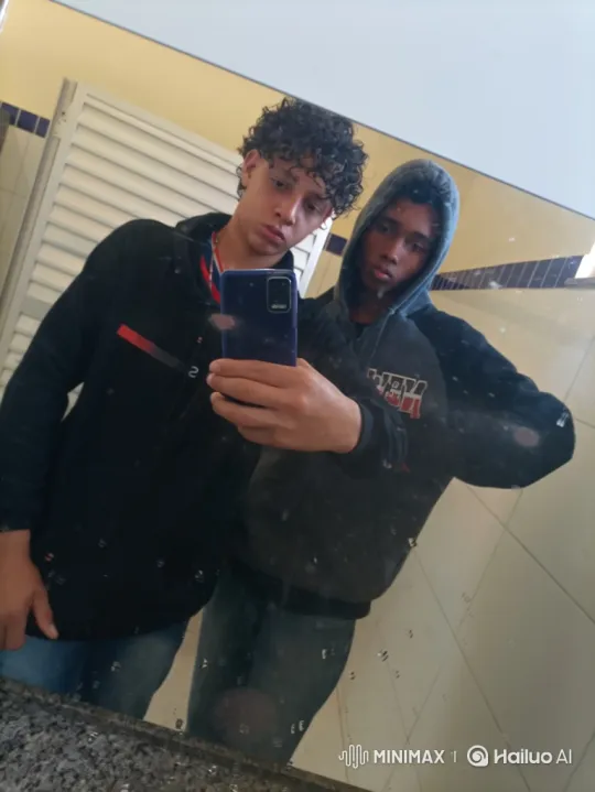 Young Men Share a Kiss in a Restroom Mirror – AI Generated Video | Hailuo AI