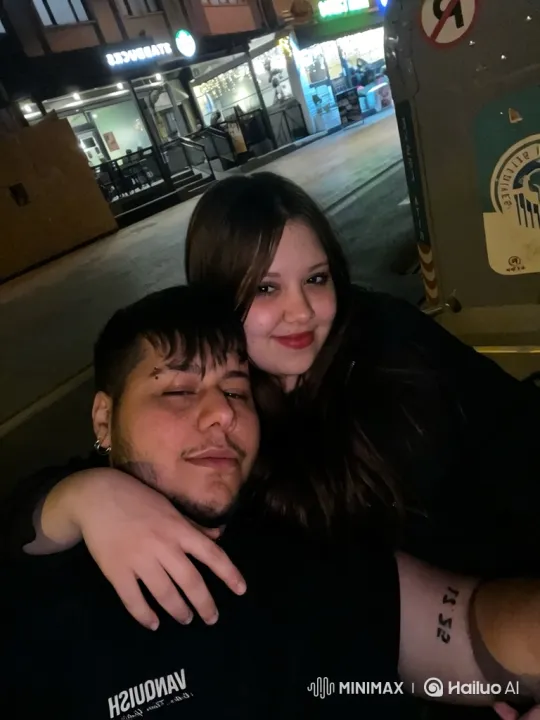 Family Embrace Captures City Night Warmth – AI Generated Video | Hailuo AI