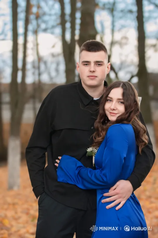 Young Couple Embraces in Autumn Park – AI Generated Video | Hailuo AI