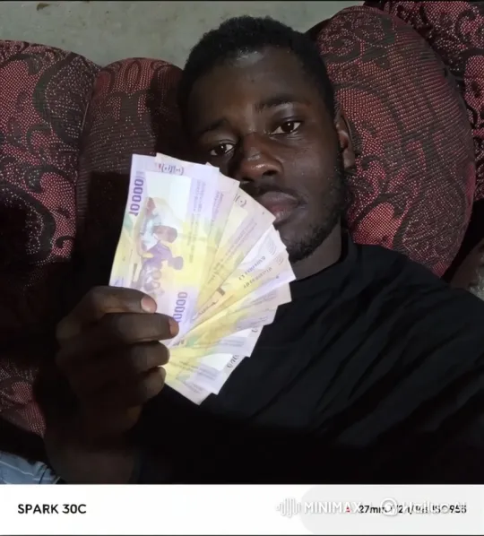 Young Black Man Flaunts Wealth with Cash Display – AI Generated Video | Hailuo AI