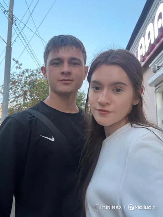 Family Reunion: Couple and Child Embrace in Evening Light – AI Generated Video | Hailuo AI