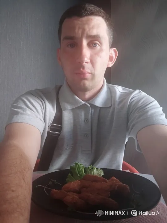 Man Eating Fried Food in Restaurant – AI Generated Video | Hailuo AI