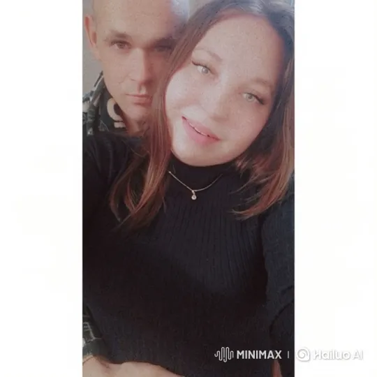 Couple Shares Intimate Moment in Soft-Lit Video – AI Generated Video | Hailuo AI