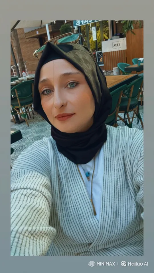 Woman's Calm Expression Captured in Café Close-Up – AI Generated Video | Hailuo AI