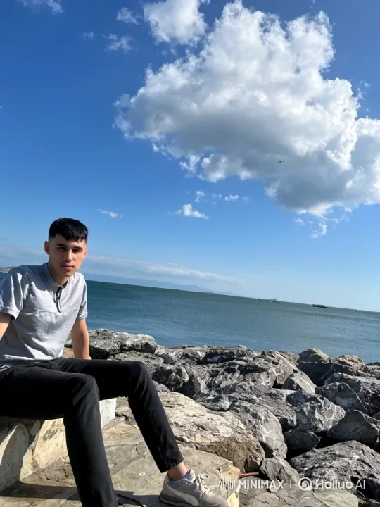 Young Man Detained by Police on Rocky Seaside – AI Generated Video | Hailuo AI