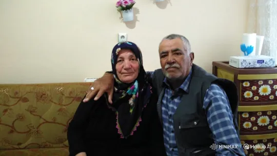 Couple Shares Affectionate Moment on Couch – AI Generated Video | Hailuo AI