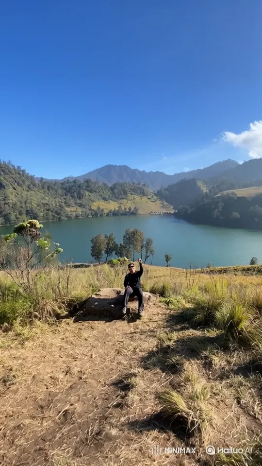 Person Contemplating in Majestic Mountain Landscape – AI Generated Video | Hailuo AI