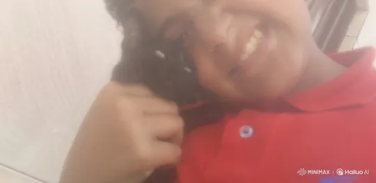 Young Person Joyfully Holds Kitten in Soft-Lit Scene – AI Generated Video | Hailuo AI