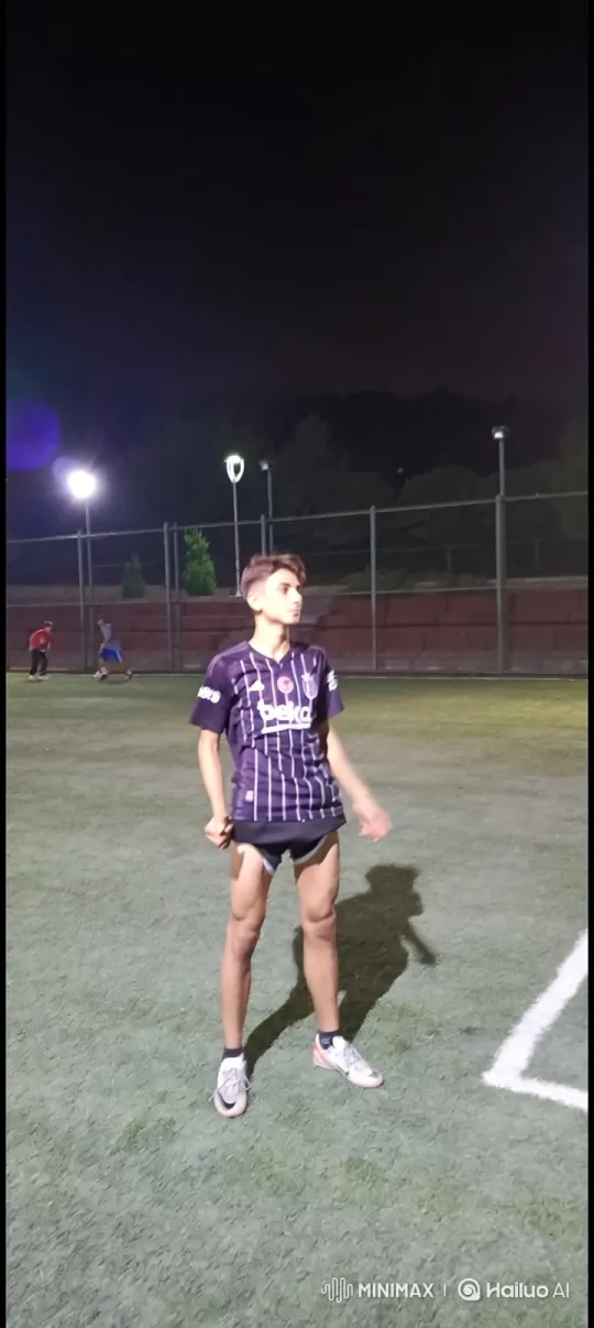 Young Soccer Player Bowing to Figure Resembling Quaresma – AI Generated Video | Hailuo AI