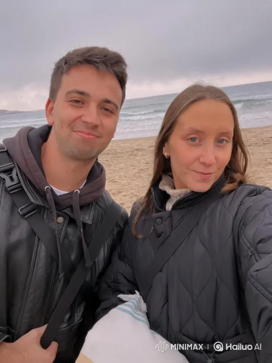 Family Embrace on a Cloudy Beach – AI Generated Video | Hailuo AI