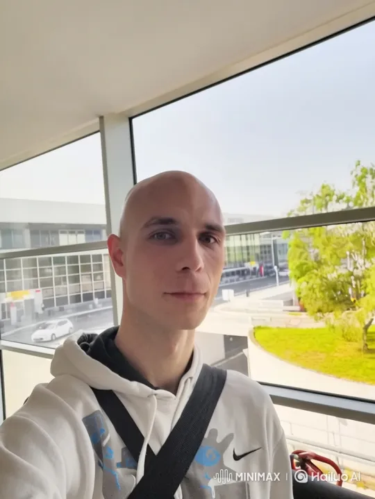 Young Man Surprised by Affectionate Kiss from Woman – AI Generated Video | Hailuo AI