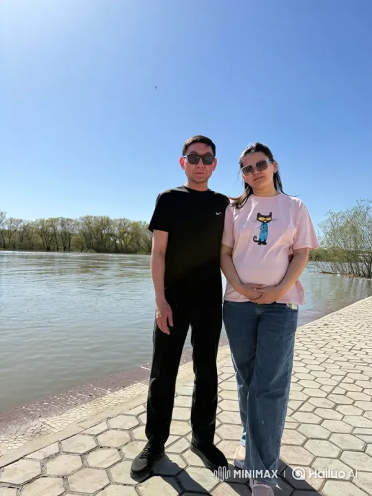 Couple's Loving Embrace by the Riverbank – AI Generated Video | Hailuo AI
