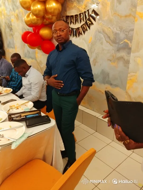 Man at Birthday Party in Thoughtful Pose – AI Generated Video | Hailuo AI