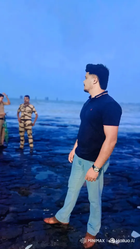 Young Man Reflects on the Dusk Sea Shoreline – AI Generated Video | Hailuo AI