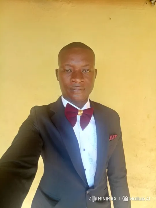 Man in Black Suit Softens Expression – AI Generated Video | Hailuo AI