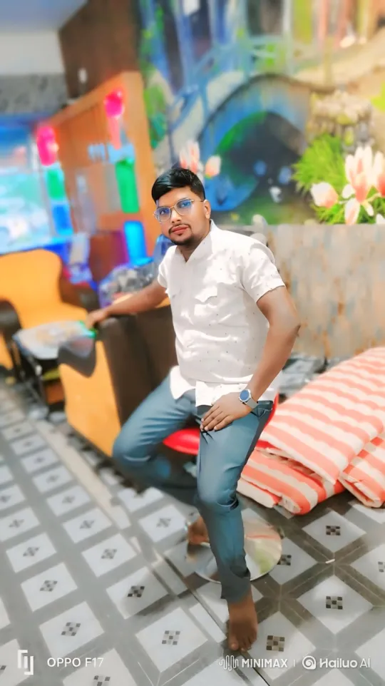 Young Man on Stool with Softening Expression – AI Generated Video | Hailuo AI