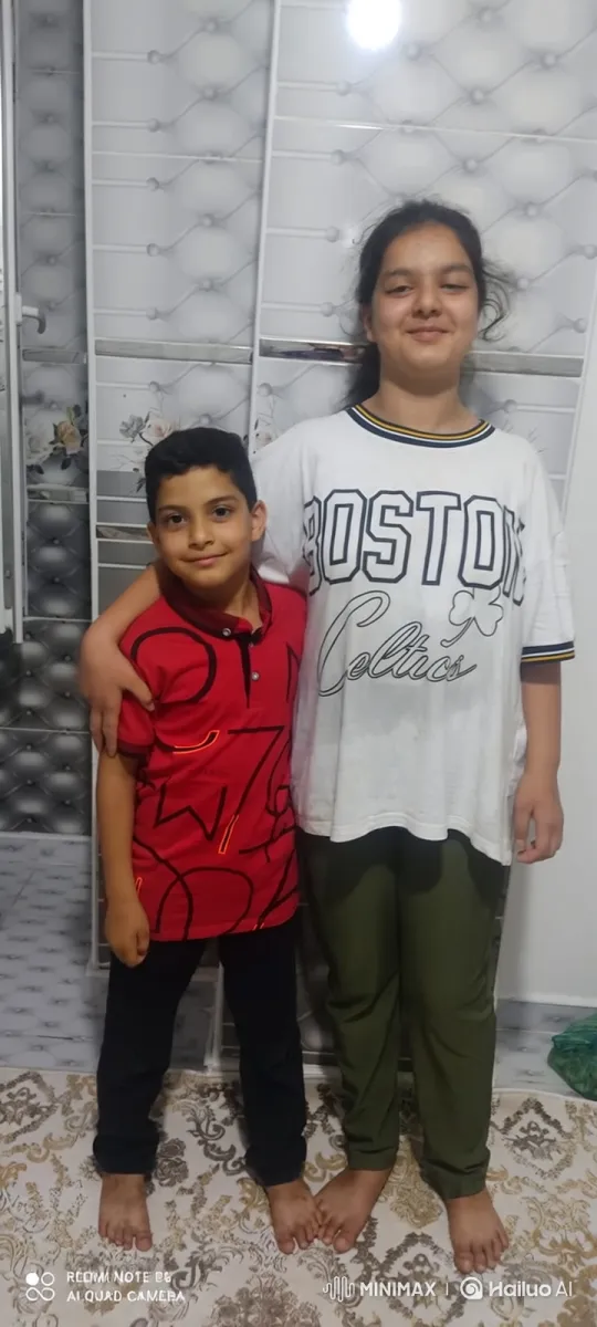 Family Portrait: Siblings and Younger Girl's Embrace – AI Generated Video | Hailuo AI
