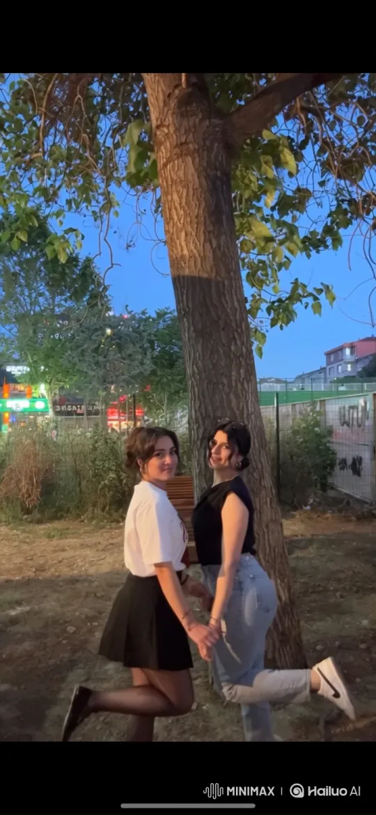Young Women Detained by Police in Park at Dusk – AI Generated Video | Hailuo AI