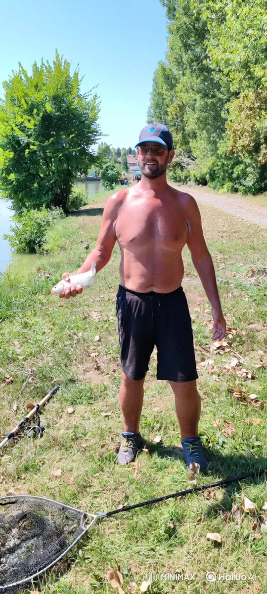 Man Struggles to Hold Enormous Grown Carp – AI Generated Video | Hailuo AI