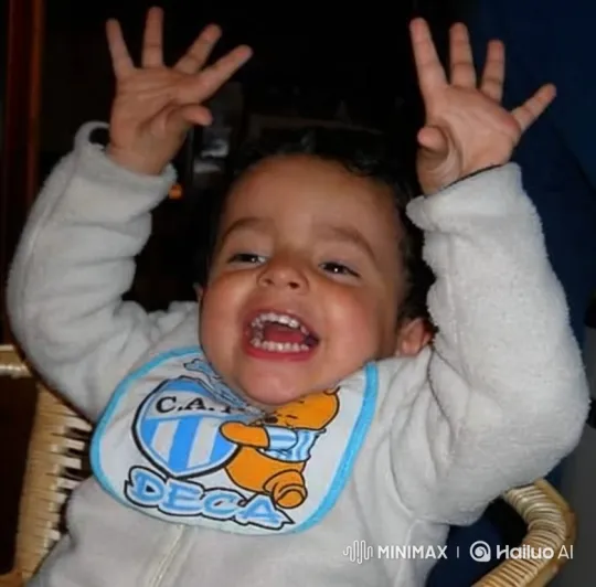 Toddler's Joyful Laughter Captured in Close-up – AI Generated Video | Hailuo AI