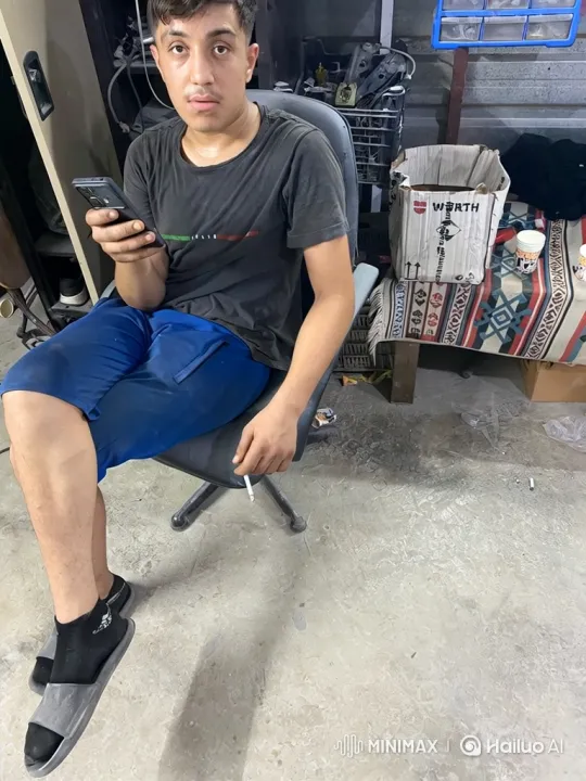 Young Couple Shares Affectionate Moment in Workshop – AI Generated Video | Hailuo AI