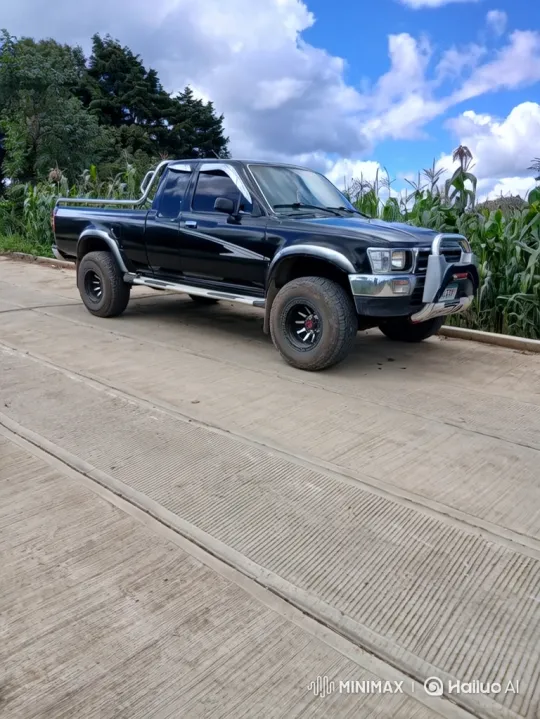 Polished Black Truck on Countryside Road – AI Generated Video | Hailuo AI