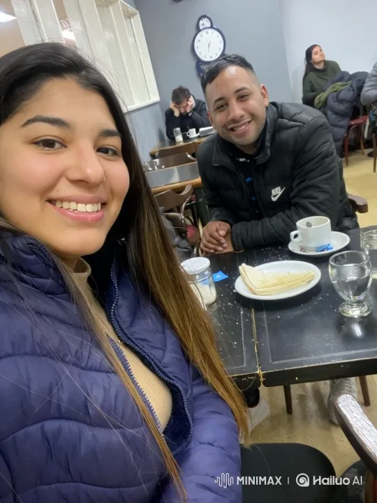 Family Enjoying a Cozy Moment in a Cafe – AI Generated Video | Hailuo AI