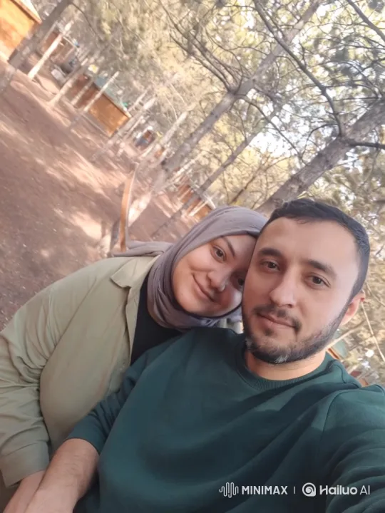 Family Embraces in Park Under Evening Lights – AI Generated Video | Hailuo AI